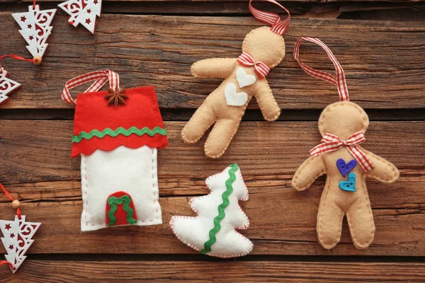 Christmas composition with soft toys on wooden background — Stock Photo, Image