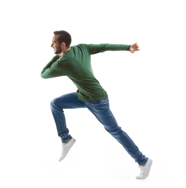 Man in casual clothes running — Stock Photo, Image