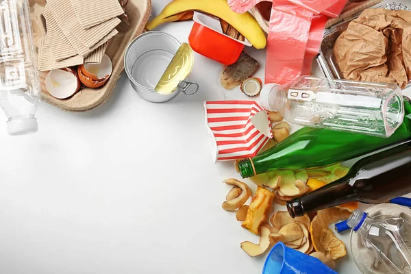 Composition with garbage on white background — Stock Photo, Image