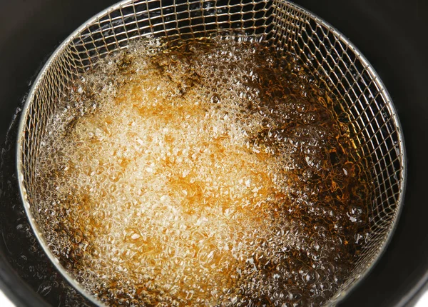 Deep fryer with boiling oil — Stock Photo, Image