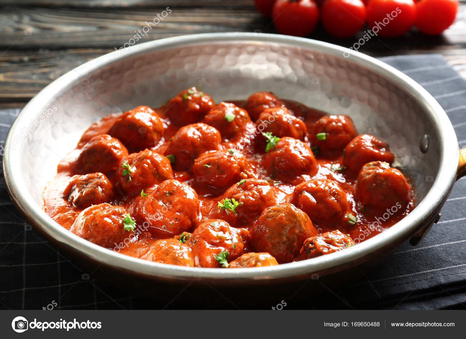Saucepan with delicious meatballs — Stock Photo © belchonock 169650488