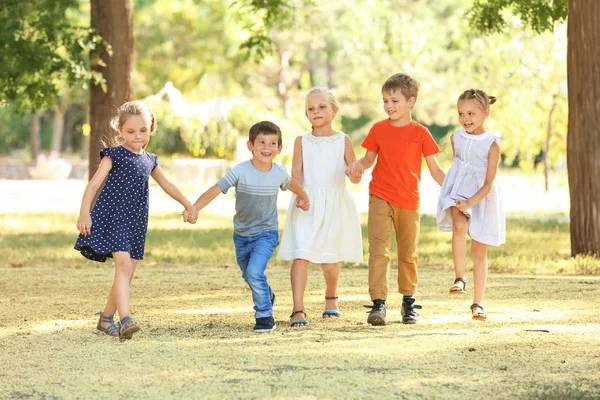 Group of children in park on sunny day — Stock Photo, Image