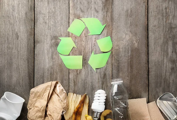 Recycling sign and garbage