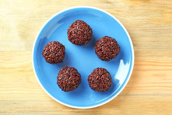 Cooked rice balls on plate — Stock Photo, Image