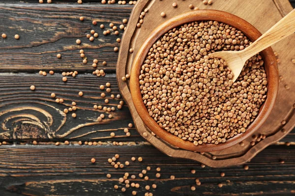 Schüssel mit braunen Linsen — Stockfoto