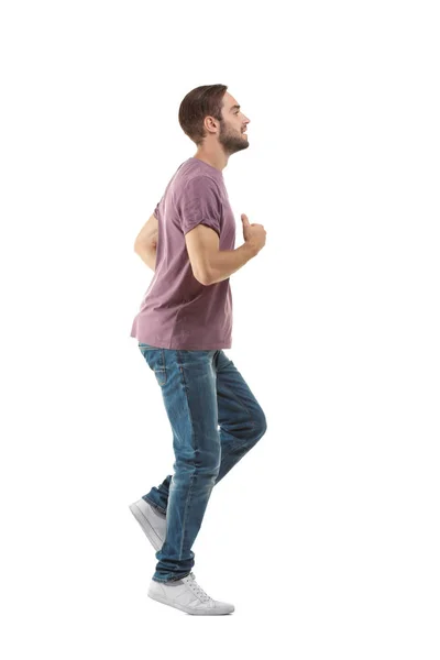 Man in casual clothes running — Stock Photo, Image