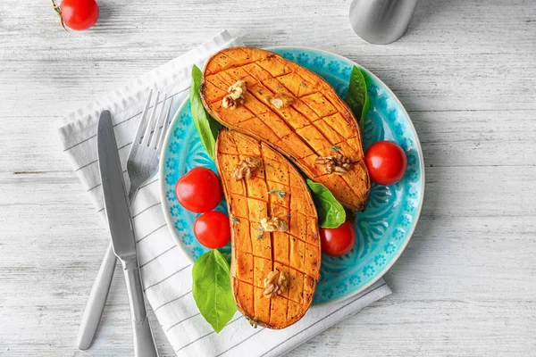 Plate with baked sweet potato — Stock Photo, Image