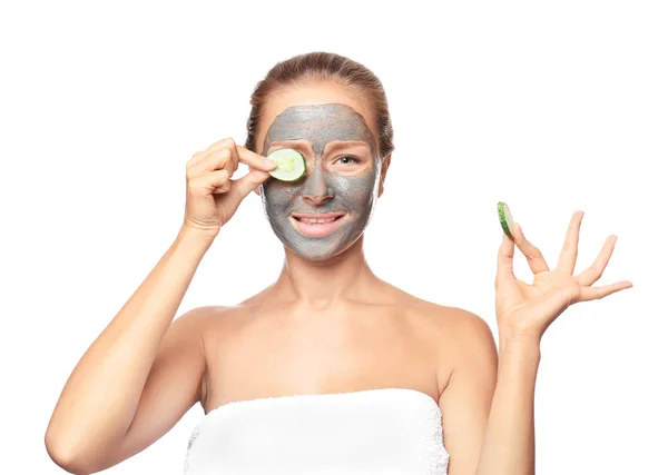 Young woman with facial mask — Stock Photo, Image