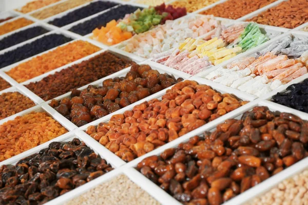 Display with different foodstuff at market — Stock Photo, Image