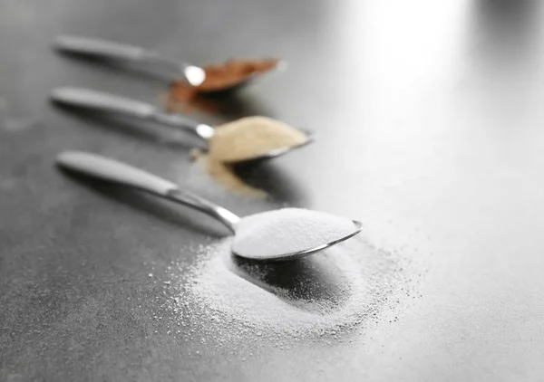 Protein powders in spoons on table — Stock Photo, Image