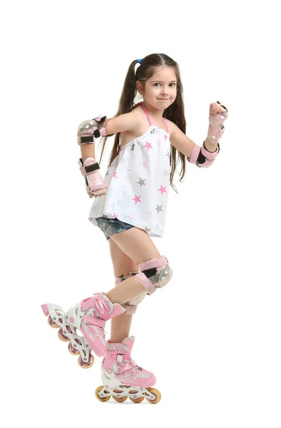 Cute girl on roller skates against white background — Stock Photo, Image