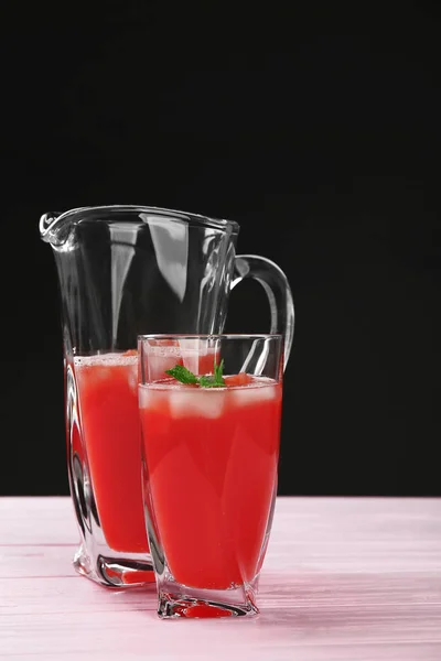 Jug and glass with watermelon juice — Stock Photo, Image