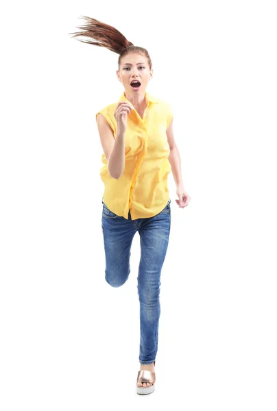 Mujer joven corriendo sobre fondo blanco —  Fotos de Stock