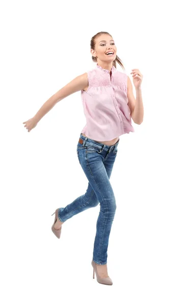 Mujer joven corriendo sobre fondo blanco — Foto de Stock