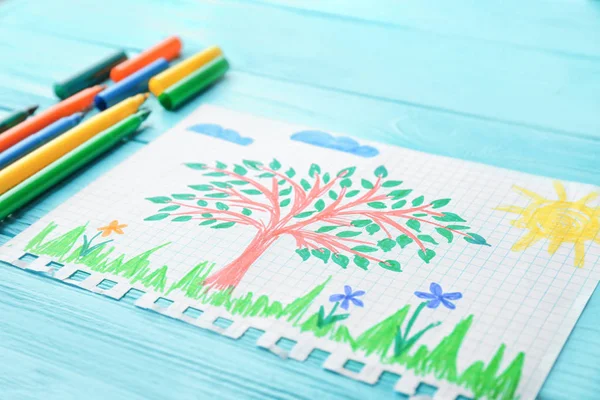 Child's drawing of tree on wooden table, closeup — Stock Photo, Image