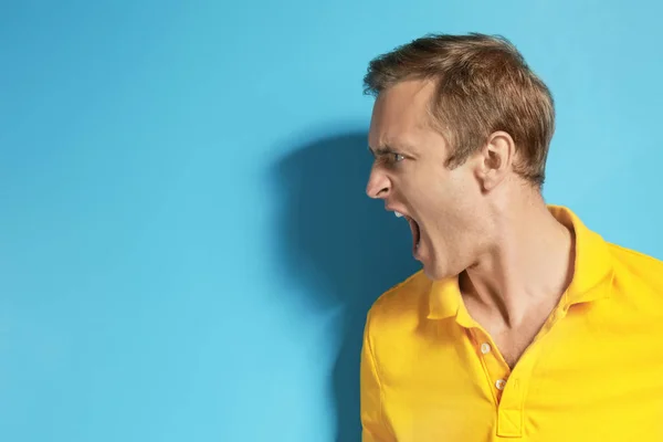 Emotional man on color background — Stock Photo, Image