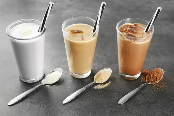 Glasses with different protein shakes — Stock Photo, Image