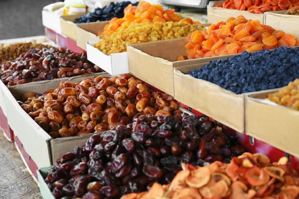 Different delicious dried fruits at market — Stock Photo, Image