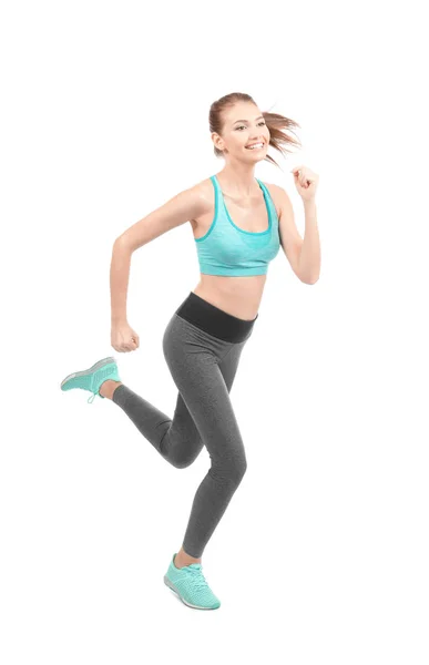 Young sporty woman running on white background — Stock Photo, Image