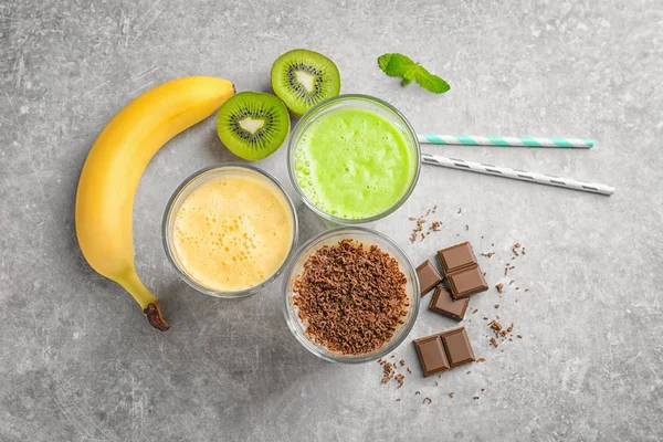 Glasses with different protein shakes — Stock Photo, Image