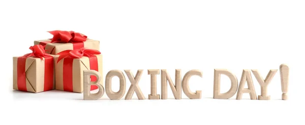 Carino scatole regalo con parole BOXING DAY, isolato su bianco — Foto Stock