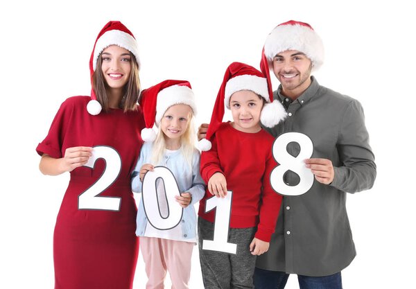 Happy family with paper figures 2018 on white background. Christmas celebration concept