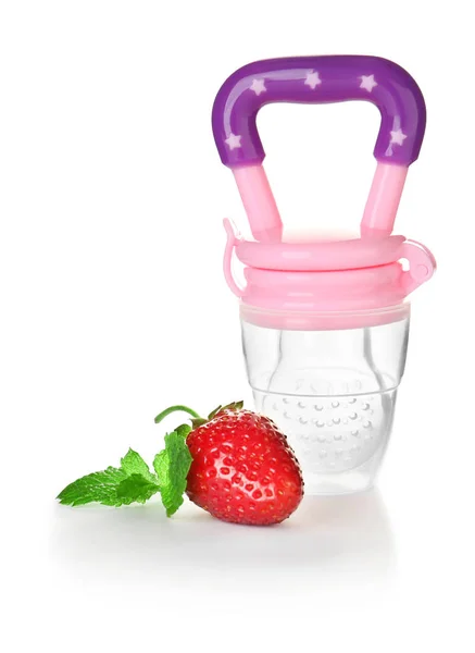 Baby nibbler and strawberry — Stock Photo, Image