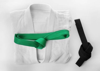 Karate uniform with belt clipart