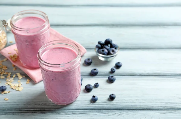 Jars with berry protein shakes — Stock Photo, Image
