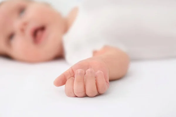 Hand of baby on light background, closeup — Stock Photo, Image