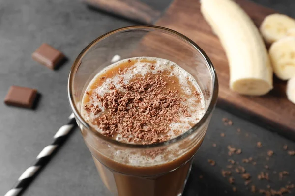 Glass with chocolate protein shake — Stock Photo, Image