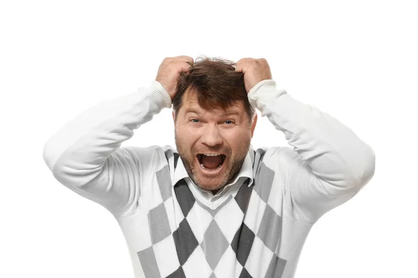 Homem de camisola puxando o cabelo no fundo branco — Fotografia de Stock