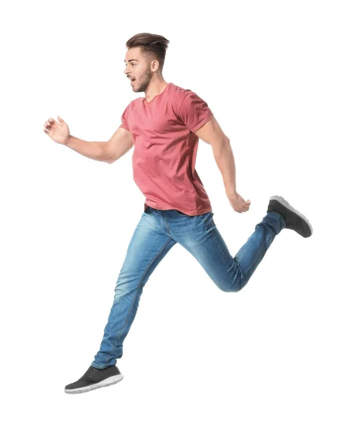 Joven con ropa casual corriendo — Foto de Stock