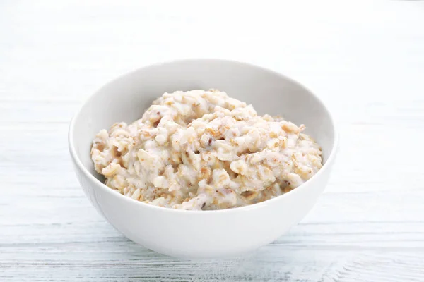 Tasty oatmeal in bowl — Stock Photo, Image