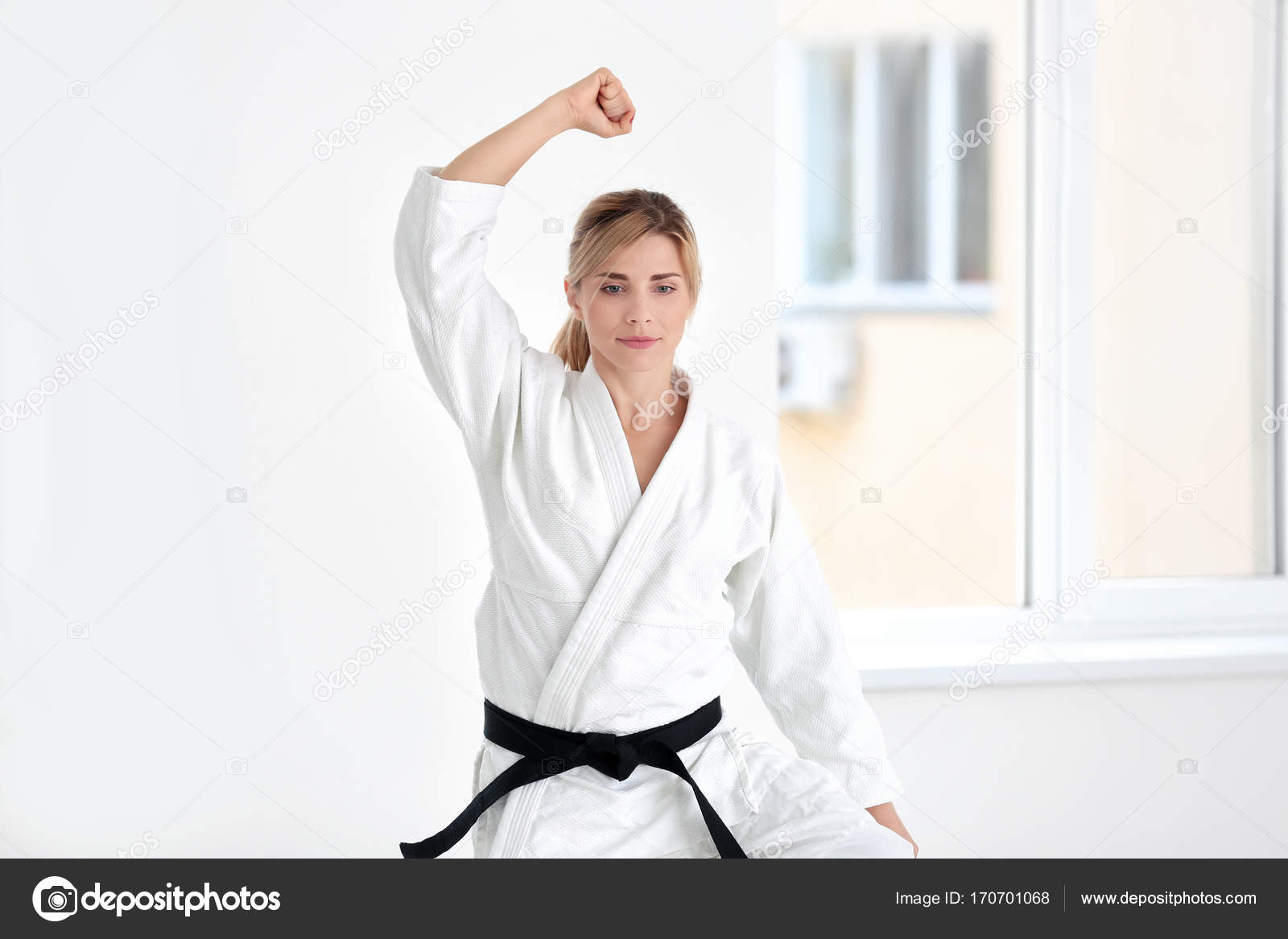 Female karate instructor training in dojo — Stock Photo © belchonock