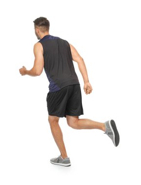 Genç adam çalıştıran spor giyim  
