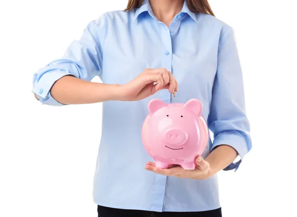 Vrouw munt ingebruikneming piggy bank — Stockfoto