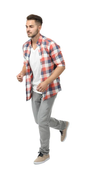 Young man in casual clothes running — Stock Photo, Image