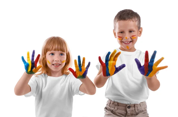 Schattige kinderen met verf op gezicht en handen tegen de witte achtergrond — Stockfoto