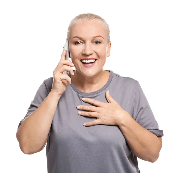 Senior woman speaking on cell phone, isolated on white — Stock Photo, Image