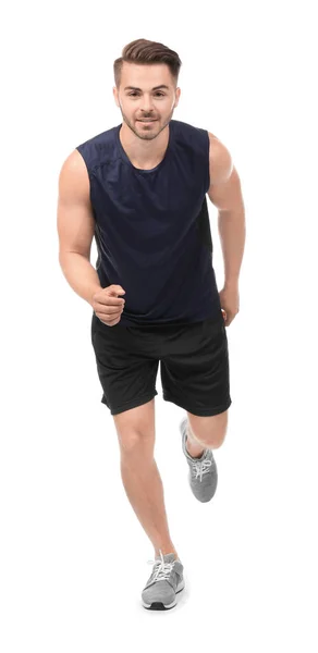 Junger Mann in Sportkleidung läuft — Stockfoto