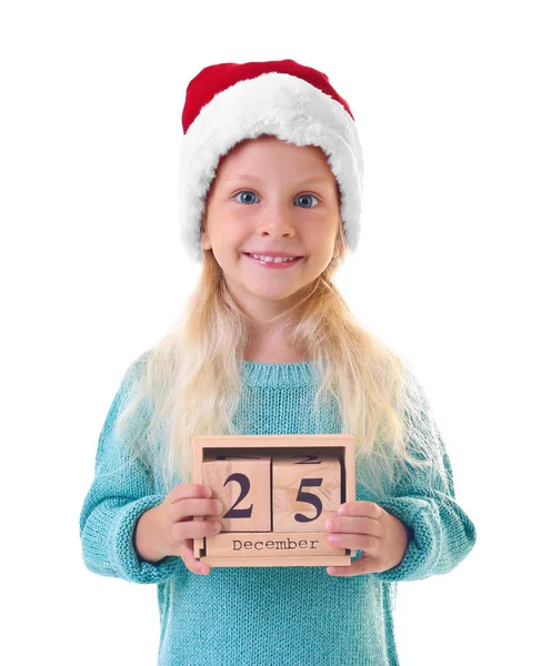 Niedliches Mädchen mit Weihnachtsmütze mit Kalender auf weißem Hintergrund. Weihnachts-Countdown-Konzept — Stockfoto