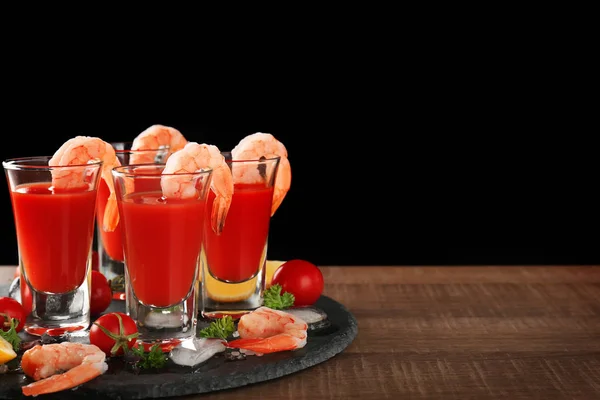 Composition with shrimps and tomato sauce in glasses — Stock Photo, Image