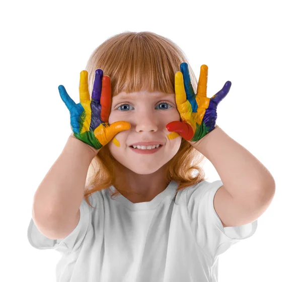 Niedliches Mädchen mit Farbe im Gesicht und den Händen vor weißem Hintergrund — Stockfoto