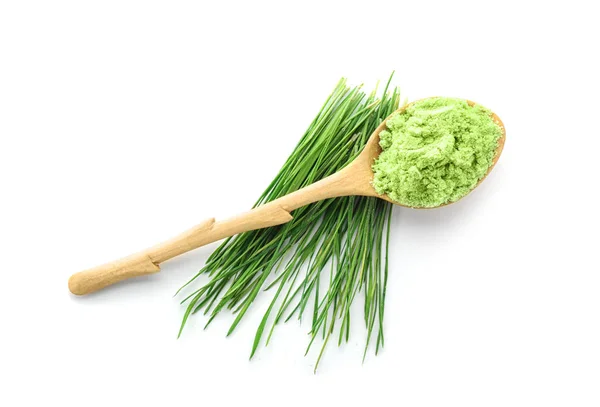 Spoon with wheat grass powder and sprouts — Stock Photo, Image