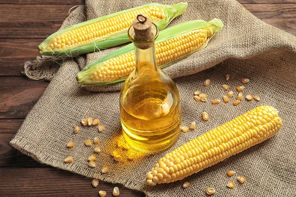 Glass bottle with corn oil