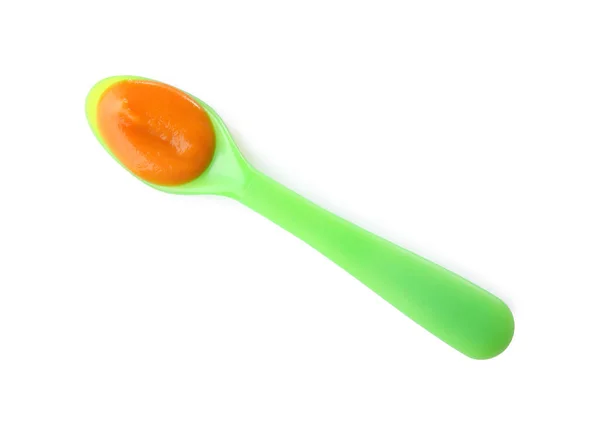 Spoon with baby food — Stock Photo, Image