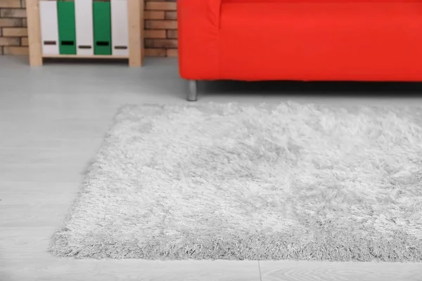 White soft carpet on floor in living room