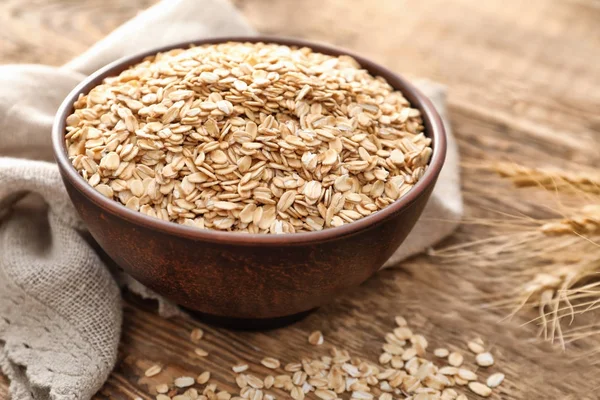 Cuenco con copos de avena —  Fotos de Stock