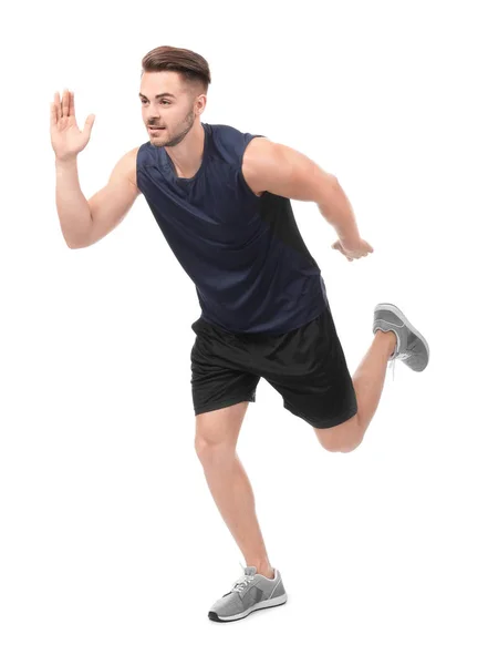 Молодий чоловік у спортивному одязі біжить — стокове фото